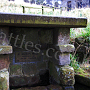 St Hilda's Well - Hinderwell<br /><br />This holy well is located in the churchyard of St Hilda's Church in the village of Hinderwell. The spring water collects in a covered chamber behind the well and then flows into a small trough between the pillars at the front.<br /><br />